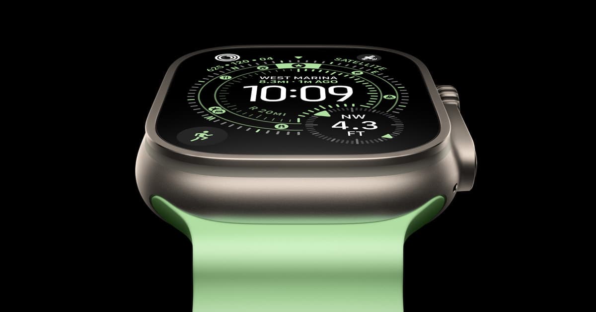 Apple Watch Ultra 3 in titanium with a green band, displaying a workout navigation watch face.