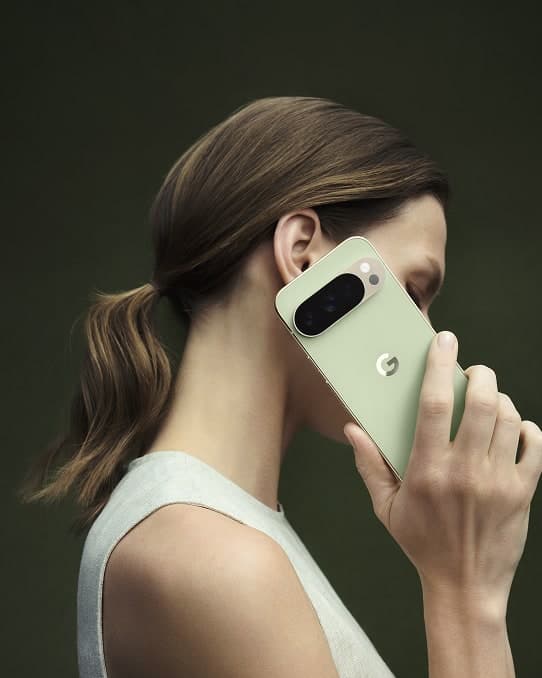 Google Pixel 10 Pro XL in Jade, held to the ear