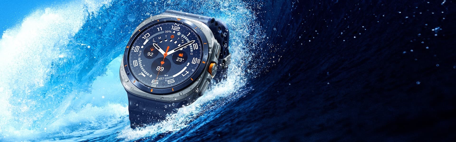 Samsung Galaxy Watch Ultra emerging from a ocean wave, showing its rugged titanium case