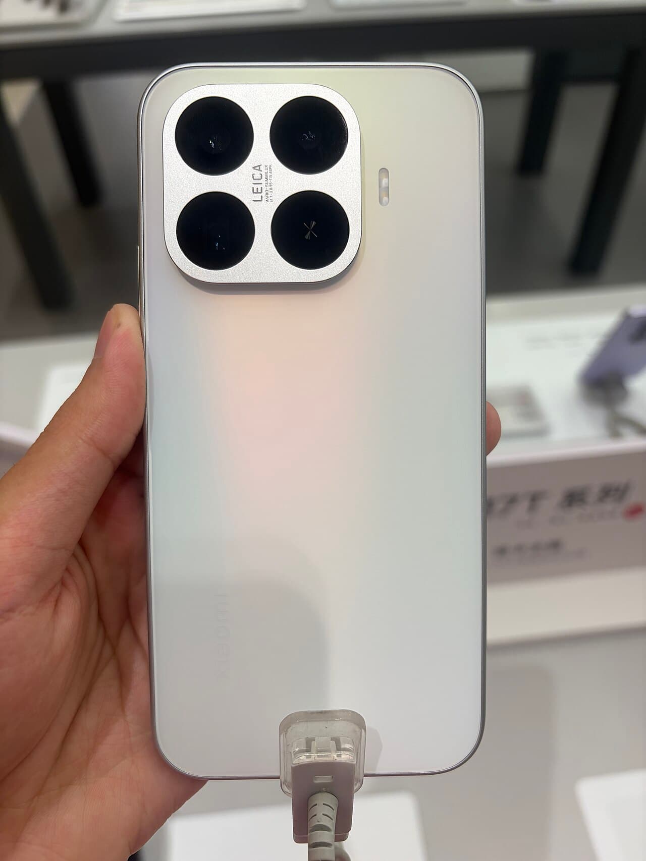 Back of the Xiaomi 17T in white with the Leica camera module