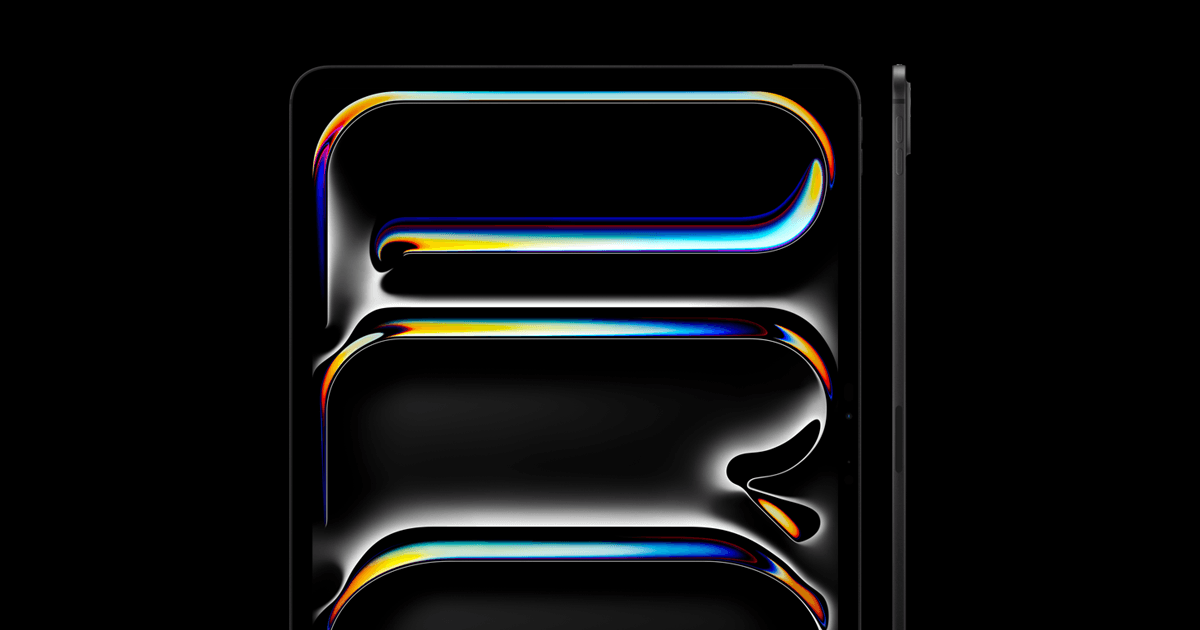 iPad Pro (M5) shown at an angle with an abstract liquid-metal reflection on the display.
